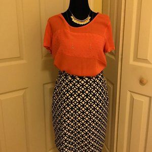Black and white skirt with Orange Blouse